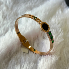 Gold Bracelet with green stones