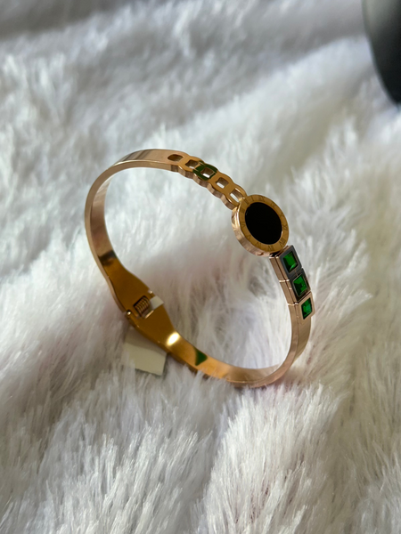 Gold Bracelet with green stones