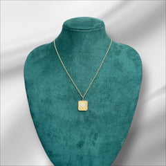 Studded heart in a square pendant