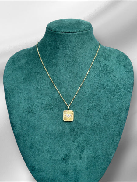 Studded heart in a square pendant