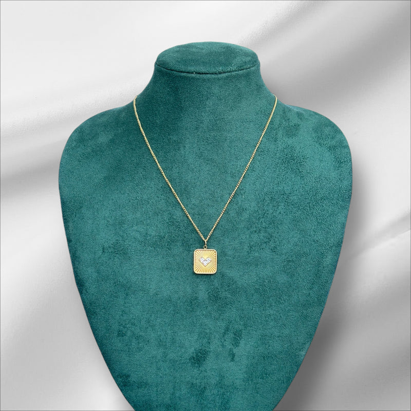 Studded heart in a square pendant